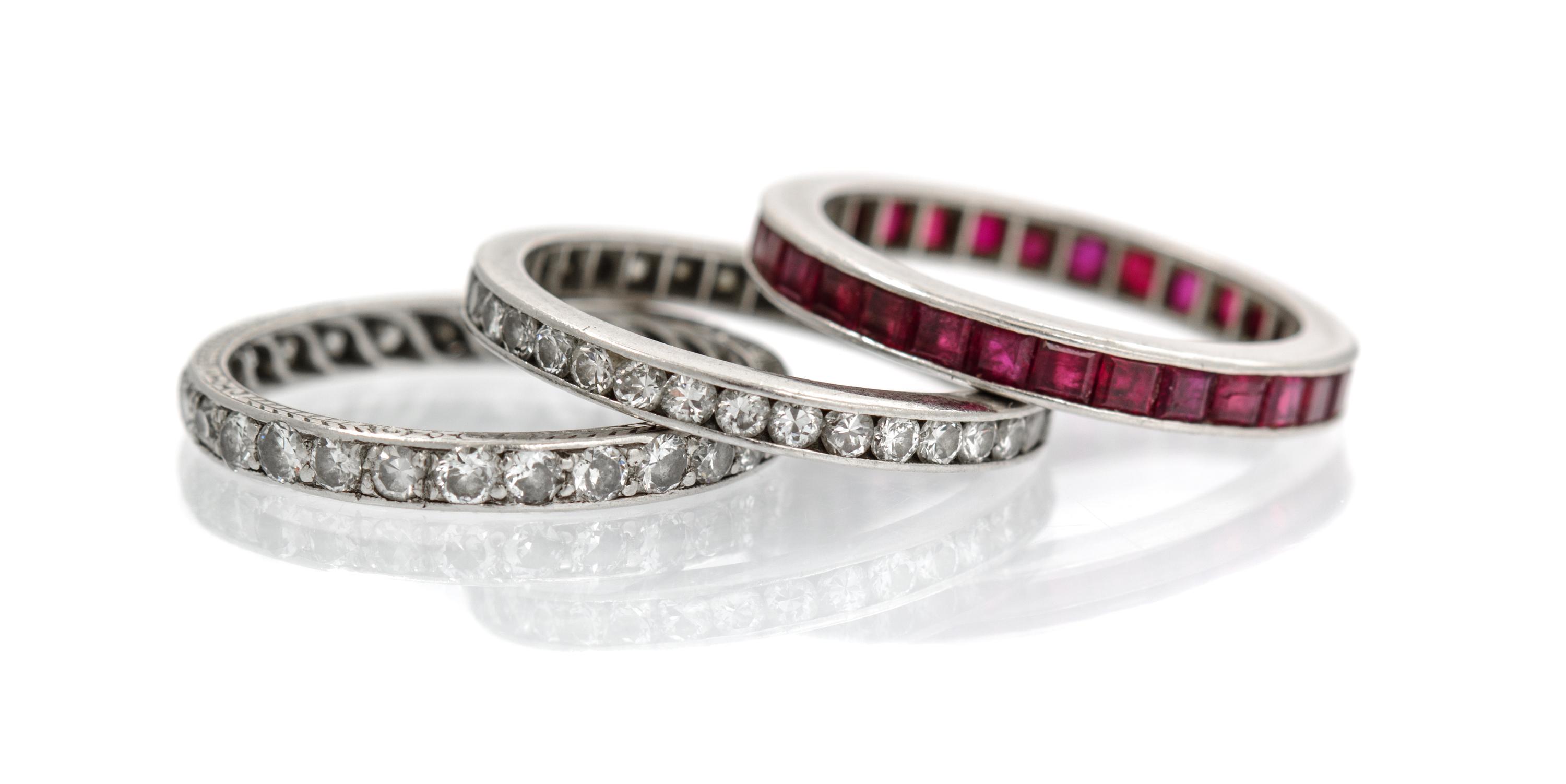 A Collection of Platinum, Diamond and Ruby Eternity Bands, 4.70 dwts.