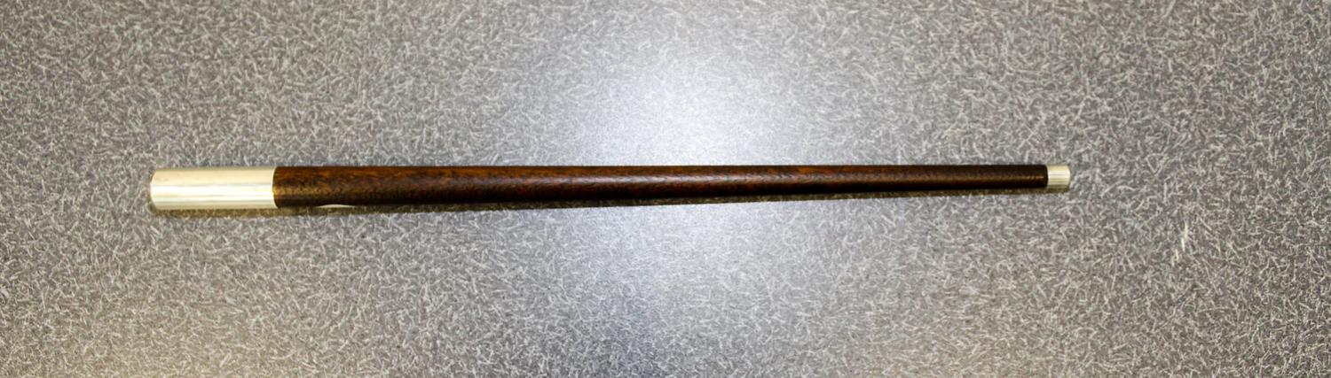 An American Silver-Mounted Walnut Jogging Stick, Reed & Barton, Taunton, MA,, having a silver ferrule with a tapering shaft, the sterli