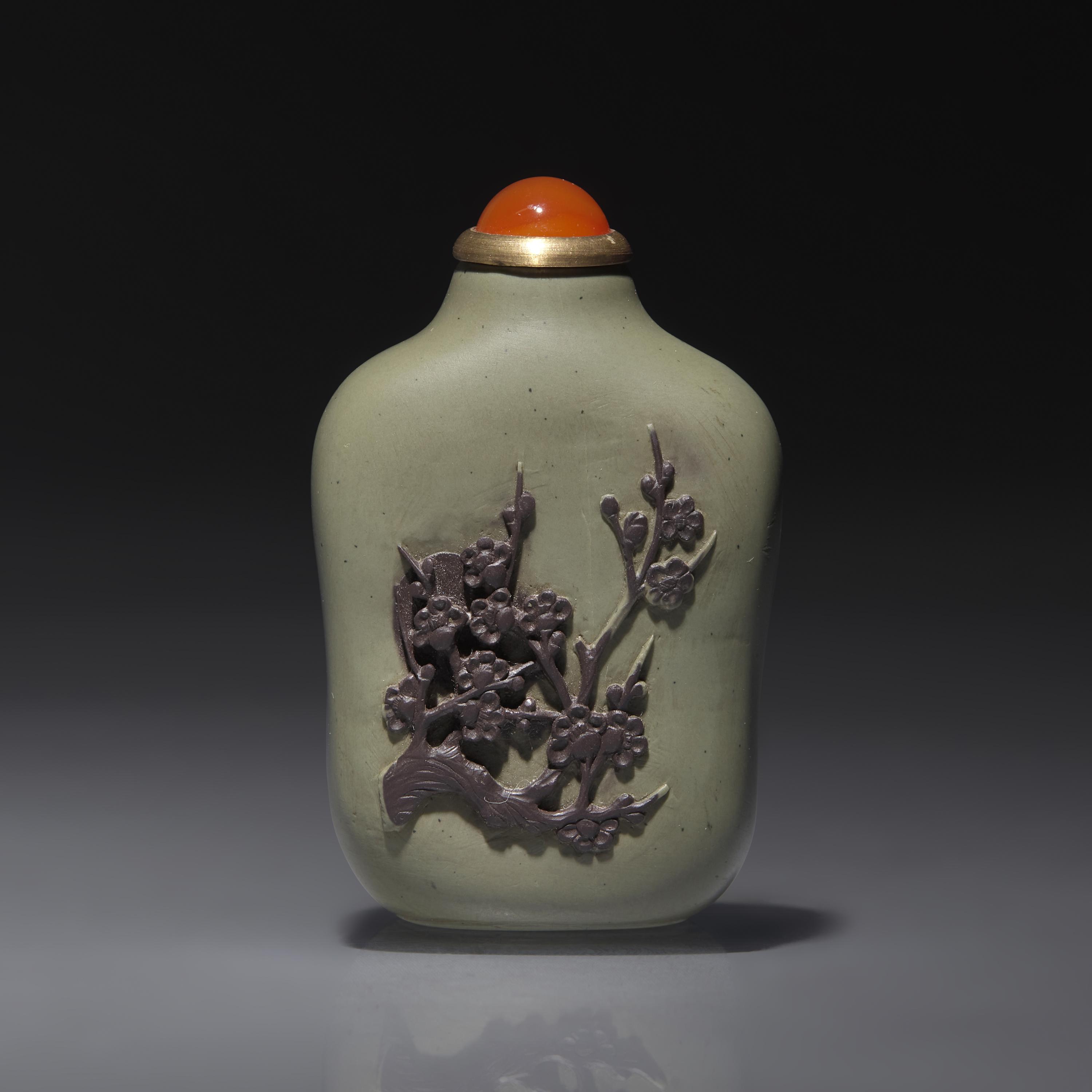A Chinese Carved Duan Stone Snuff Bottle, Qing Dynasty, Circa 1740-1880 — 1740–1880年 雙色端石巧雕梅花詩文鼻煙壺