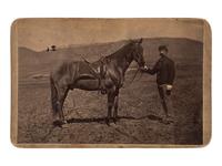 [LATE INDIAN WARS]. GOFF, O.S. (1843-1916), photographer. Cabinet photograph of Comanche, sole survivor of the Battle of Little Bighorn. Bismarck, Dakota Territory.