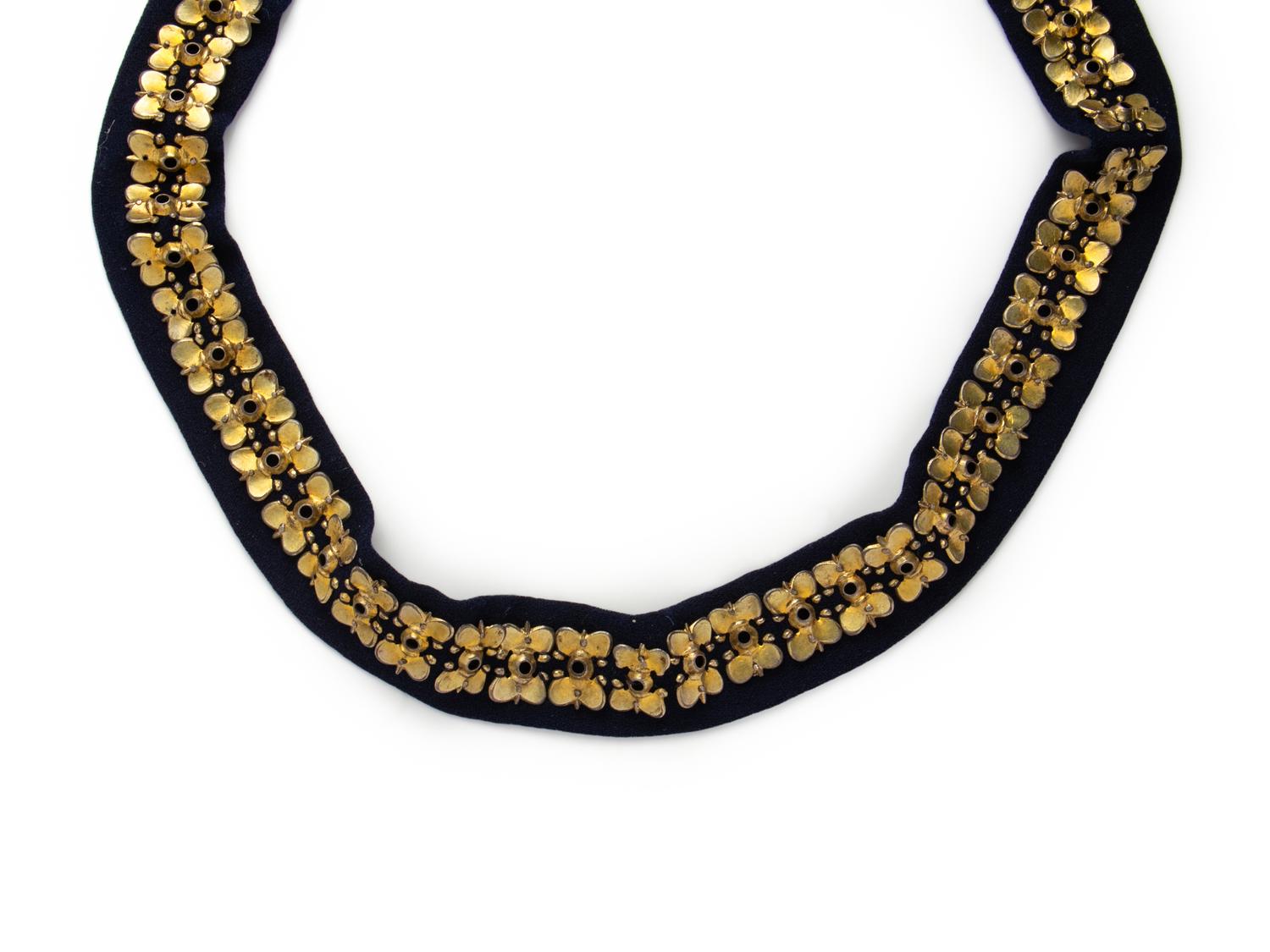 A Carolingian Gilt-Silver Belt with Buckle, Clasp, and 62 Fittings
