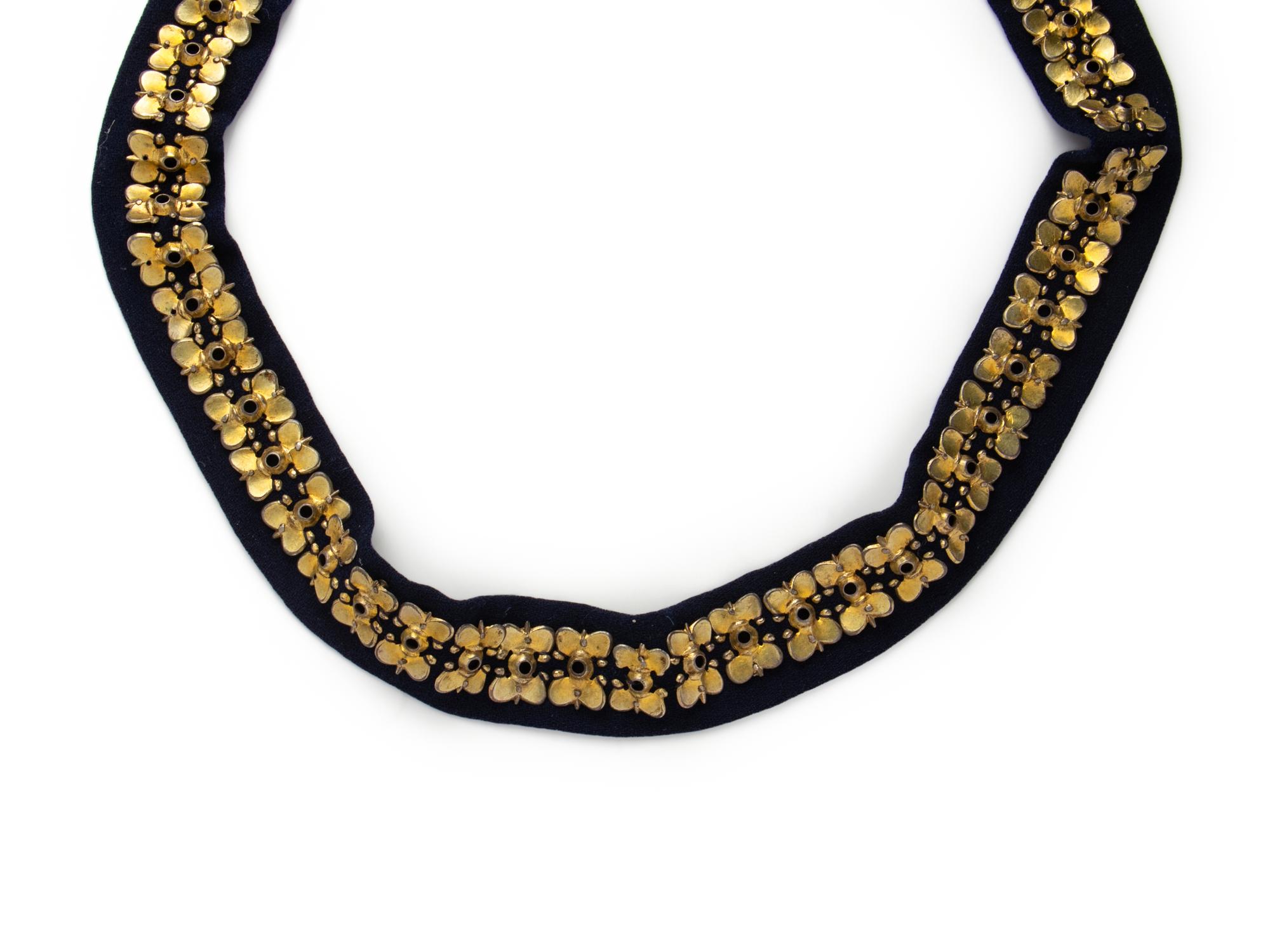A Carolingian Gilt-Silver Belt with Buckle, Clasp, and 62 Fittings