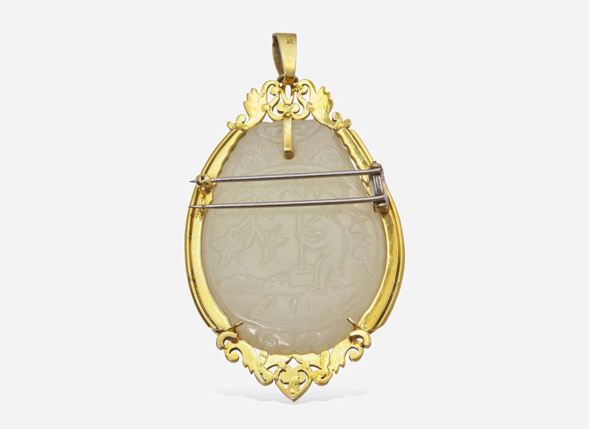 A 14K Yellow Gold and Jade Brooch