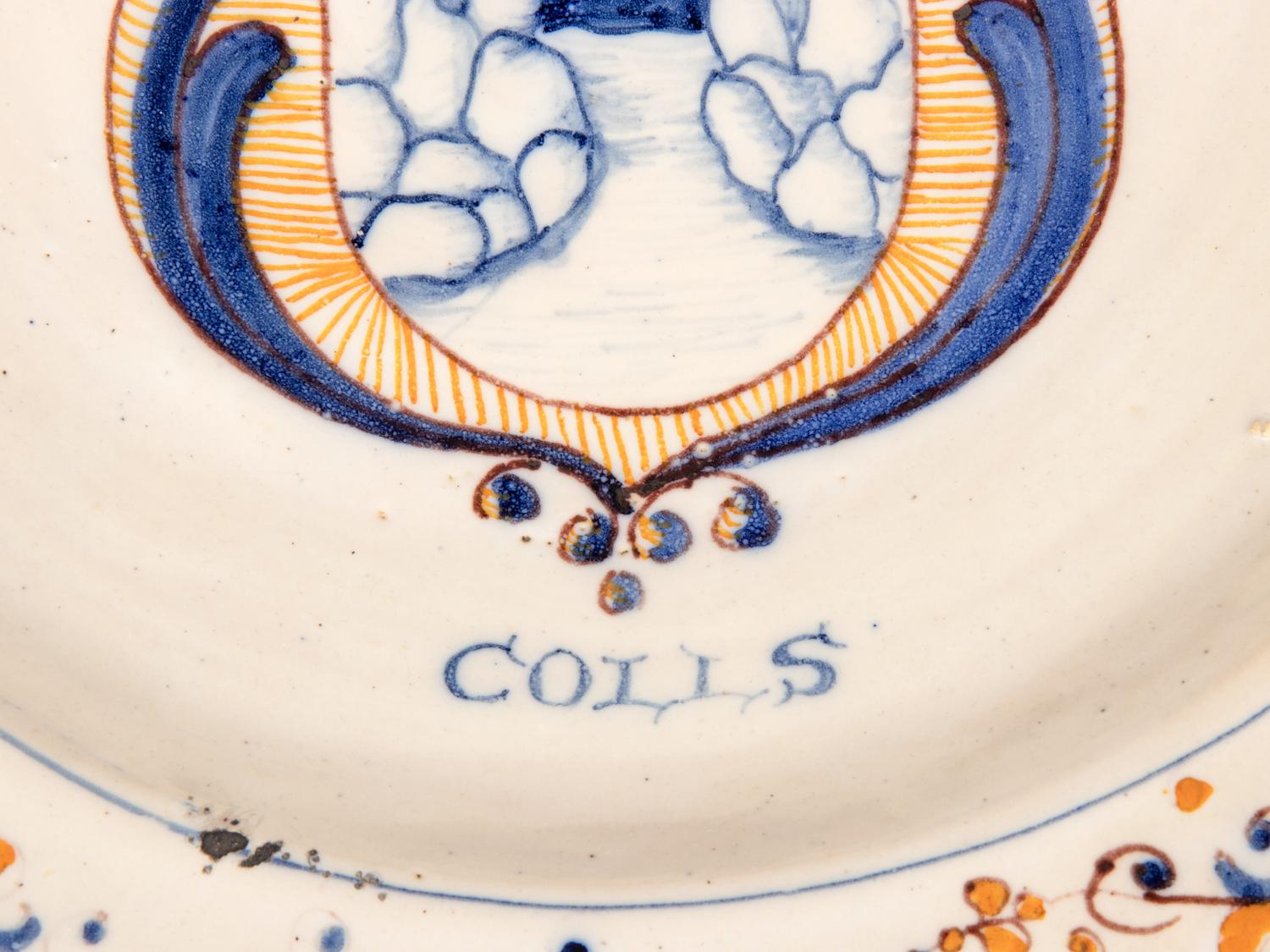 A Dutch Glazed Earthenware Armorial Charger