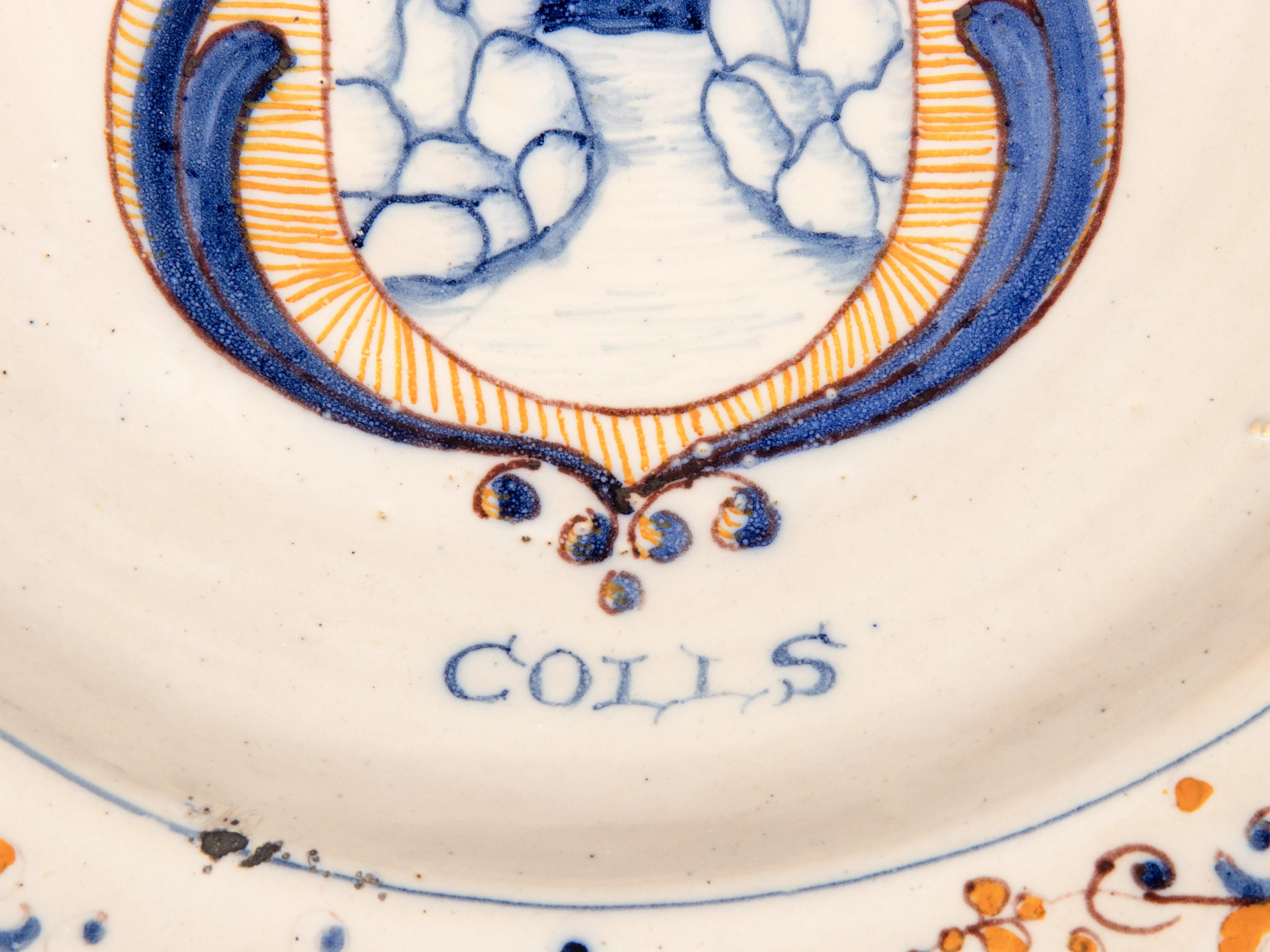 A Dutch Glazed Earthenware Armorial Charger