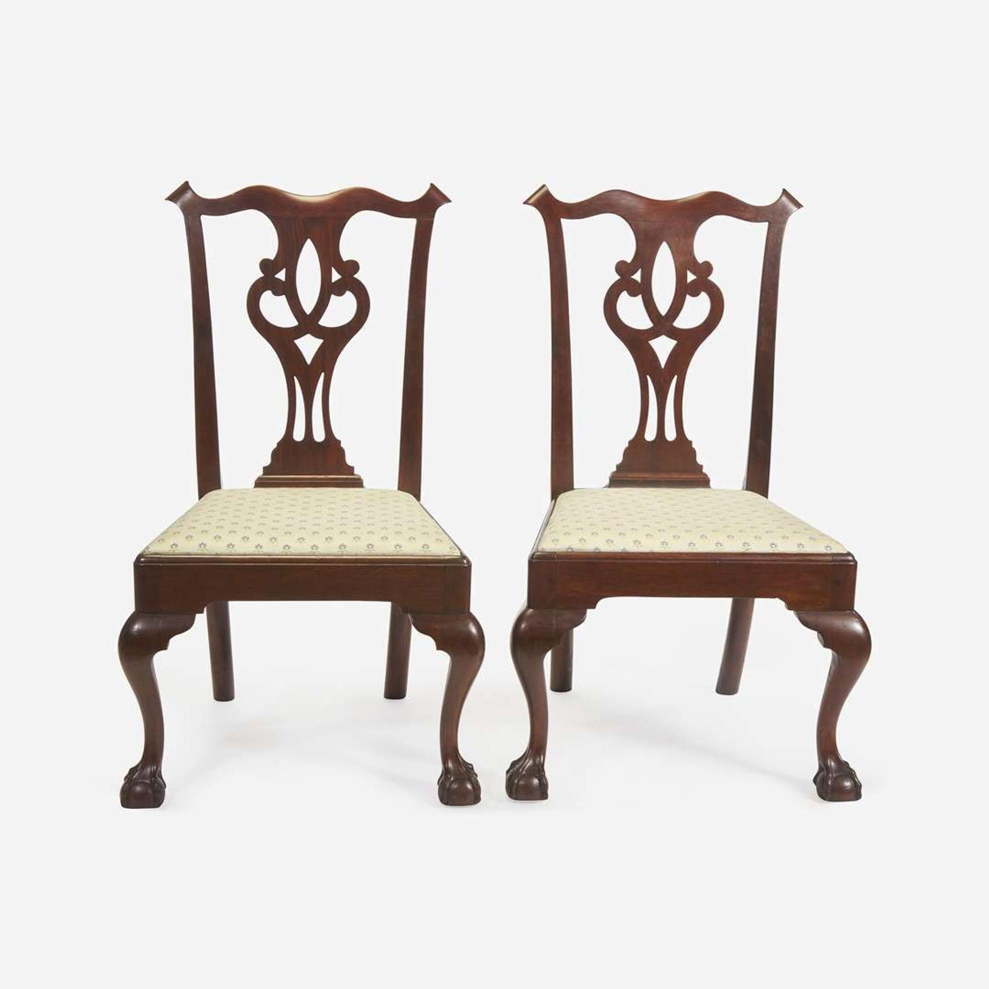 A pair of Chippendale carved walnut side chairs One bearing partial printed label for Benjamin Randolph (1737-1792), Philadelphia, PA, circa 1770