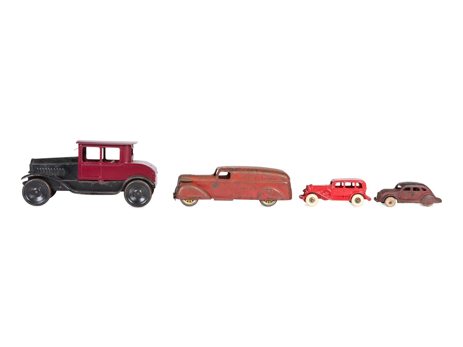 A Group of Toy Service Stations and Cars