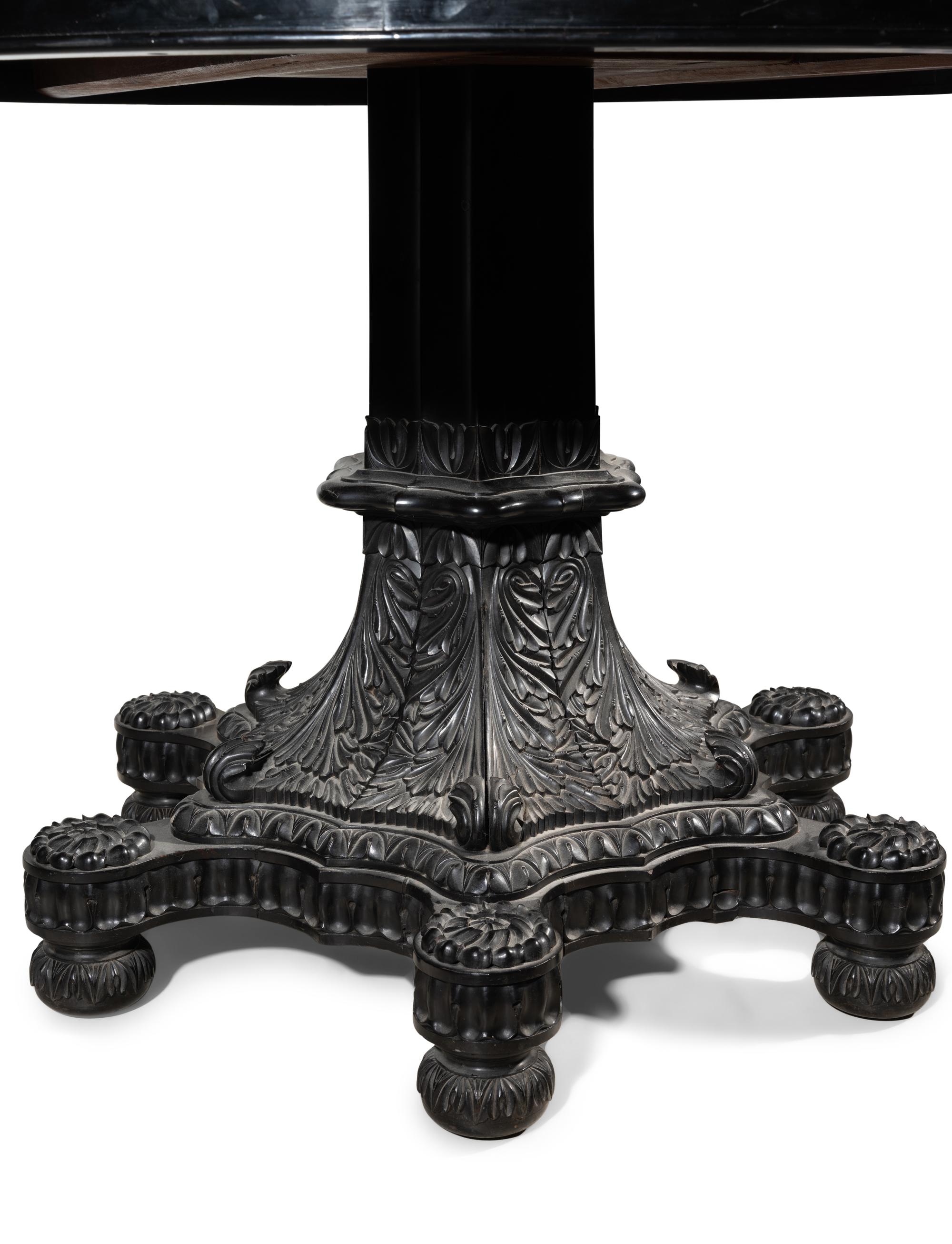An Anglo-Colonial Carved and Specimen Woods Inlaid Tilt-Top Breakfast Table