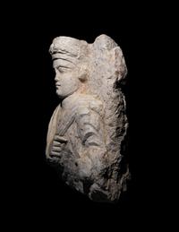 A Palmyrene Limestone Bust of a Priest