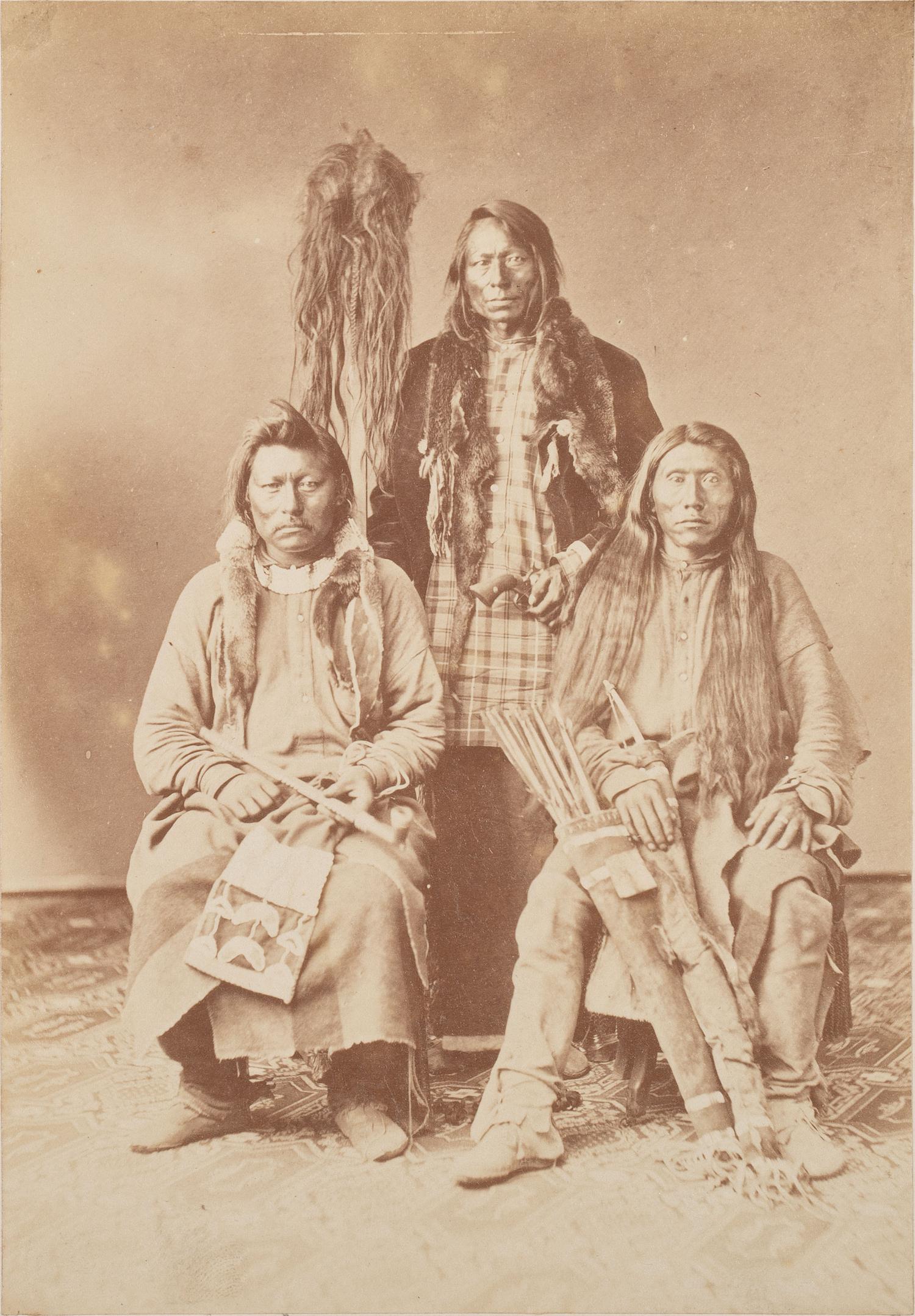 Johnson and Co. with Scalp . Albumen photograph of Ute Braves involved with the Battle of Milk Creek. Ca 1870s.