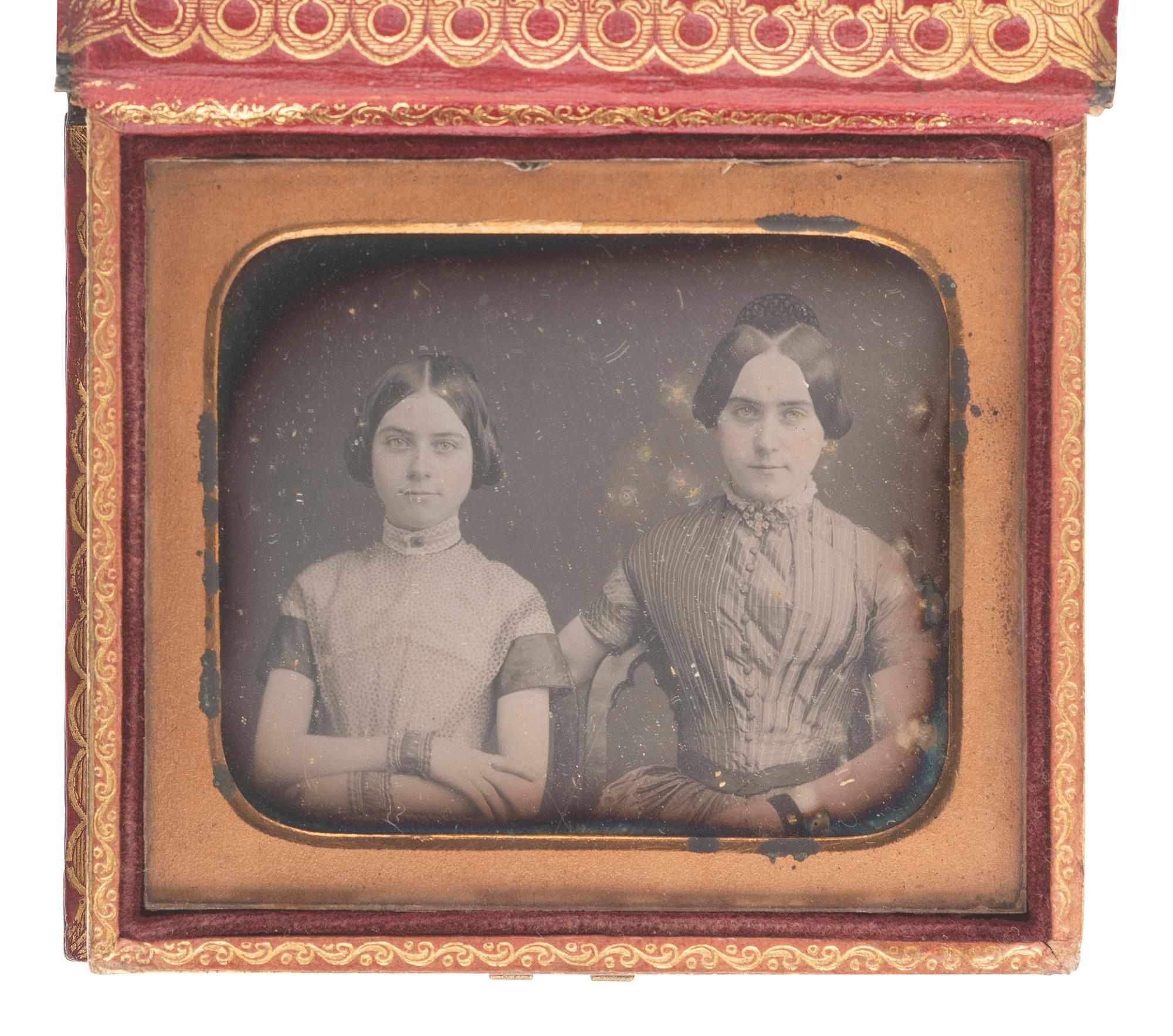[EARLY PHOTOGRAPHY]. 14 sixth plate daguerreotypes featuring pairs and trios of sitters.