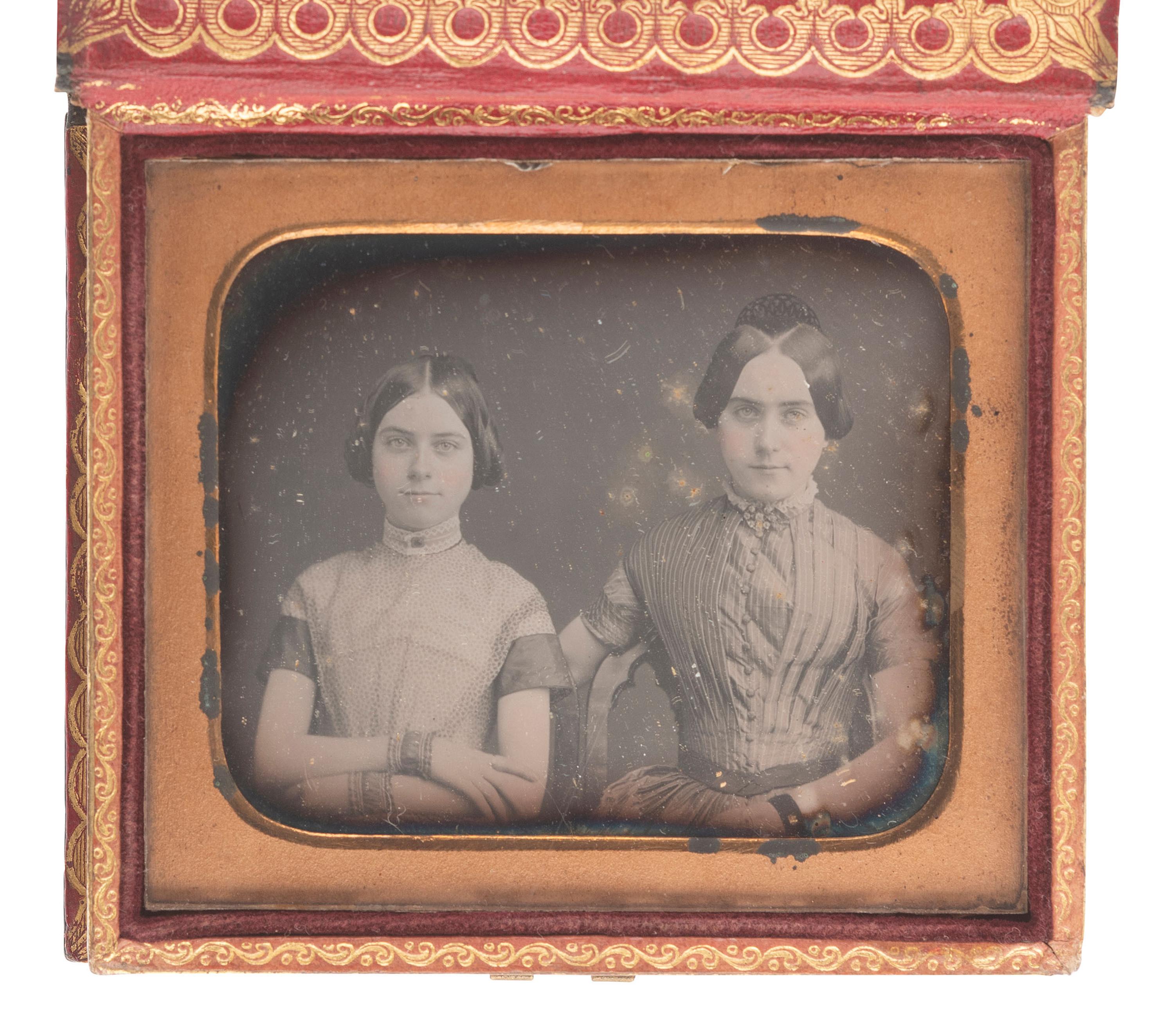 [EARLY PHOTOGRAPHY]. 14 sixth plate daguerreotypes featuring pairs and trios of sitters.
