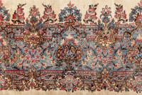 A Kirman Wool Rug
