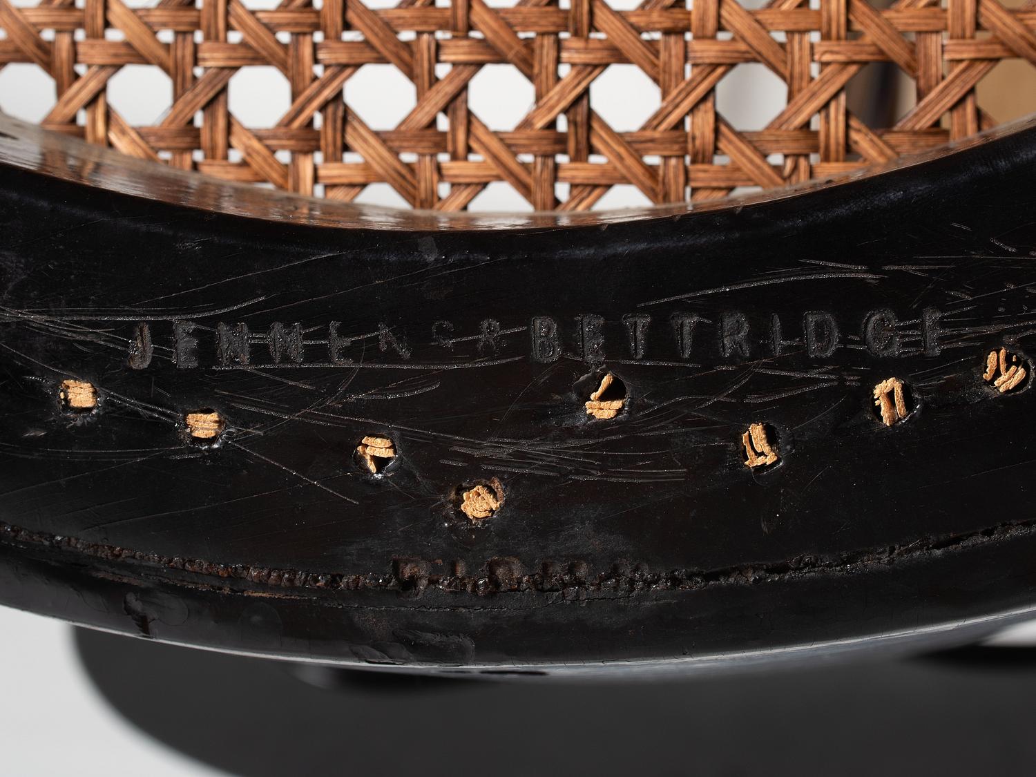 Two Victorian Black Lacquered Parcel-Gilt and Mother-of-Pearl Inlaid Cane Upholstered Slipper Chairs