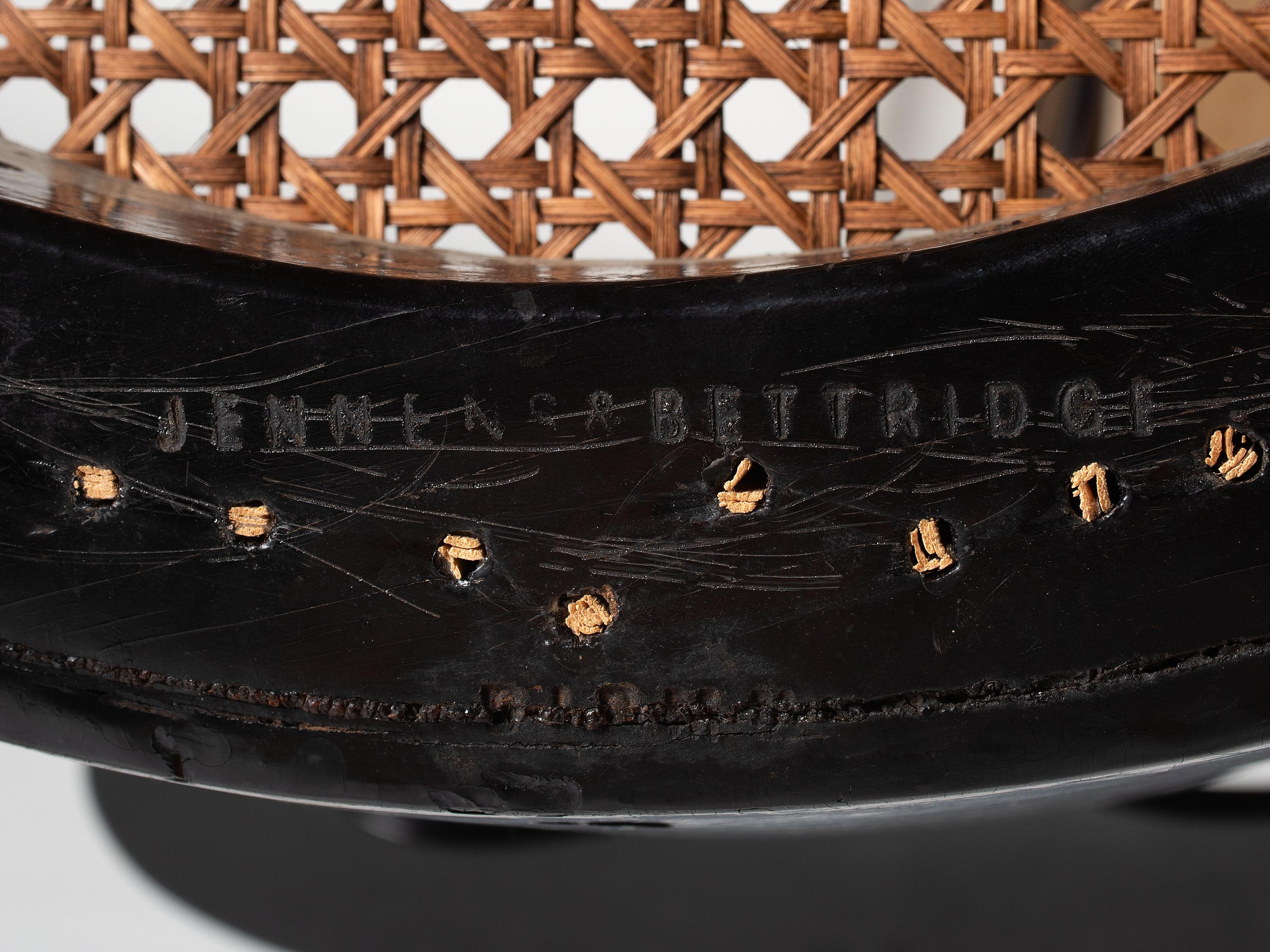 Two Victorian Black Lacquered Parcel-Gilt and Mother-of-Pearl Inlaid Cane Upholstered Slipper Chairs