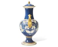 A Wedgwood Parcel Gilt Queensware Twin-Handled Vase and Cover