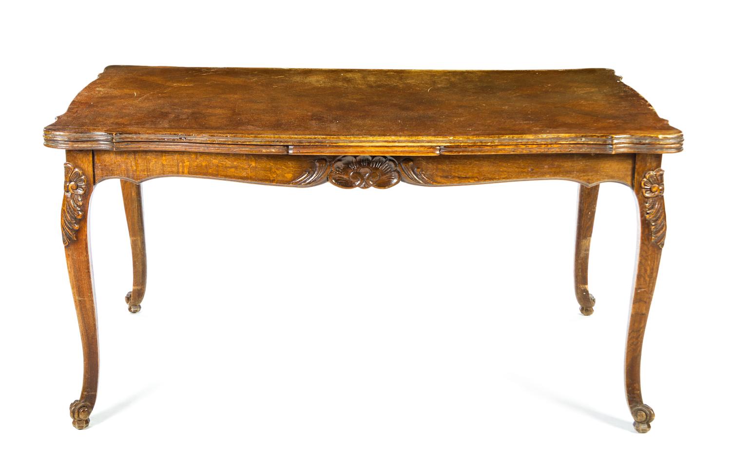 A French Provincial Draw Leaf Table Height 30 x width 59 x depth 39 inches (closed). — 19TH/20TH CENTURY