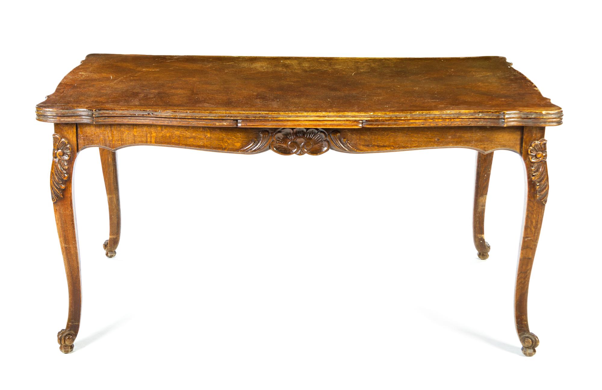 A French Provincial Draw Leaf Table Height 30 x width 59 x depth 39 inches (closed). — 19TH/20TH CENTURY