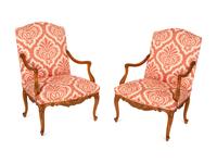 A Pair of Régence Style Walnut Fauteuils
