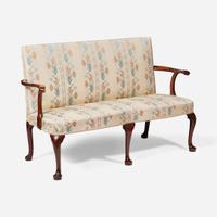 A George I carved walnut settee circa 1720