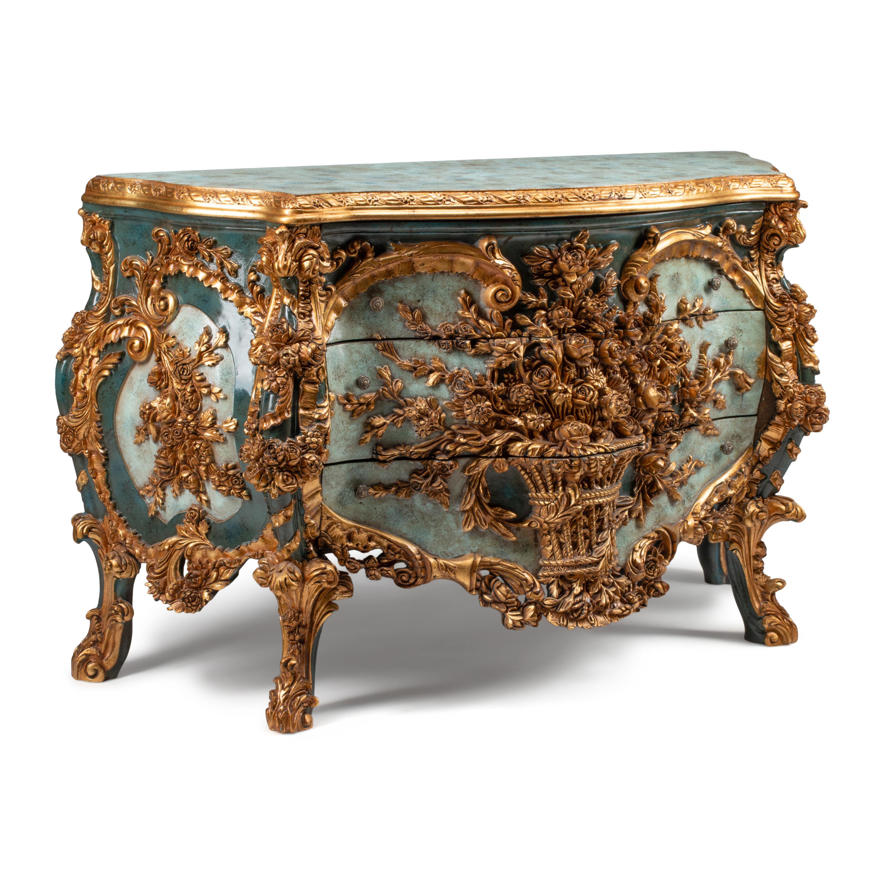 An Italian Carved, Painted and Parcel Gilt Commode