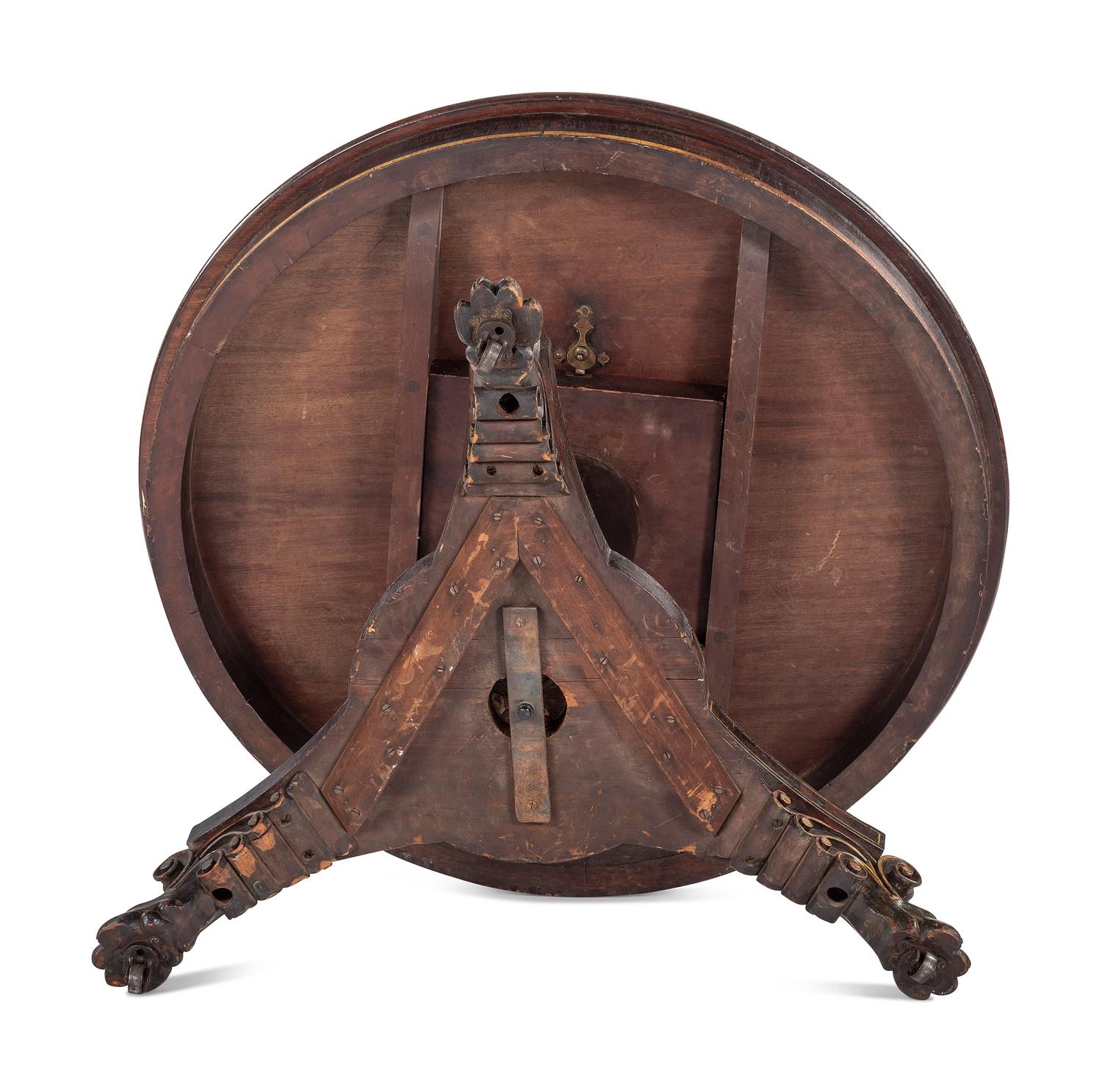 A Classical Parcel Gilt, Stencil Decorated, Carved and Inlaid Mahogany Tilt-Top Claw-Foot Breakfast Table