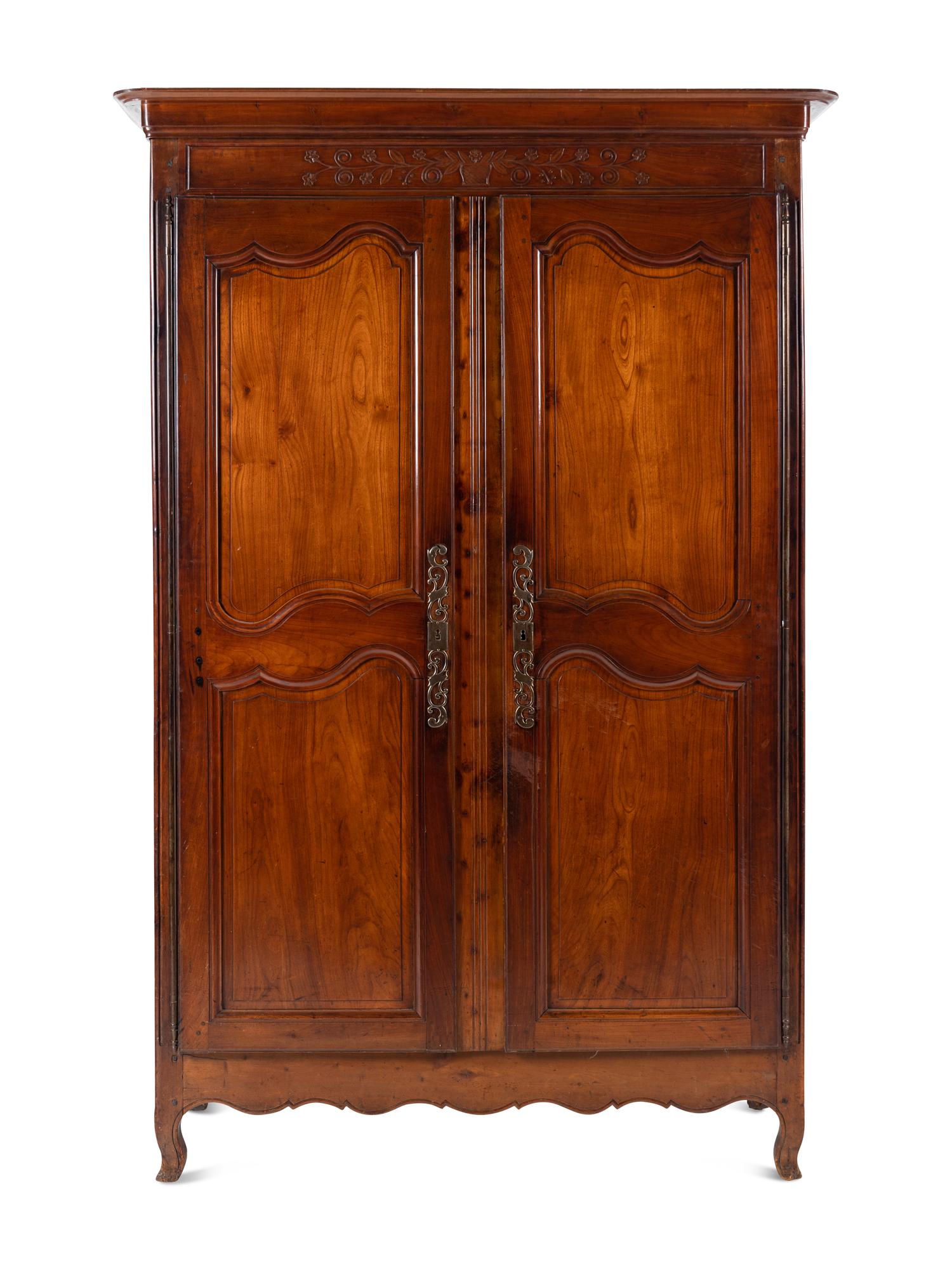 A Louis XV Provincial Walnut Armoire