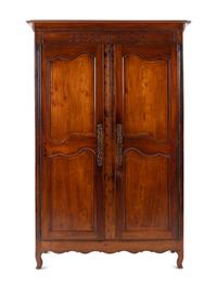 A Louis XV Provincial Walnut Armoire