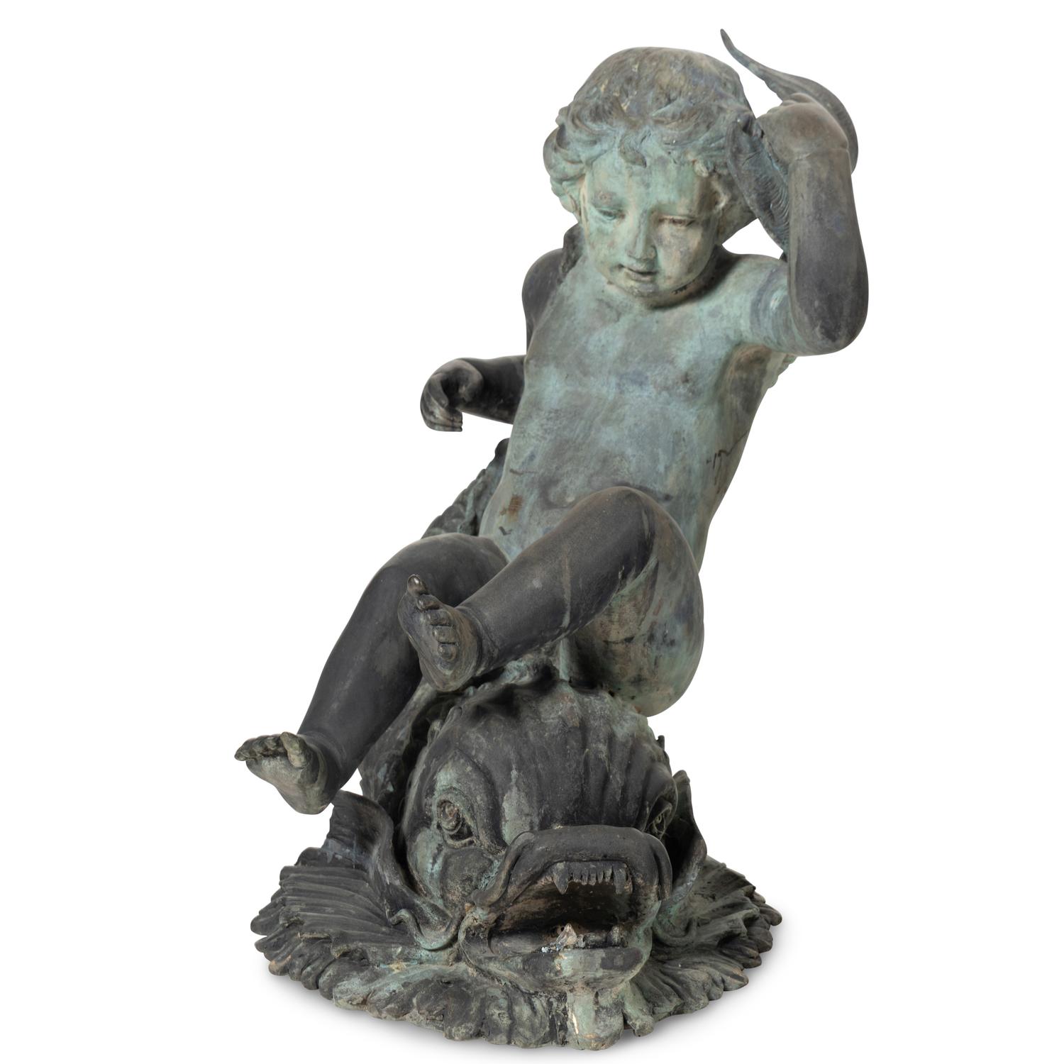 A Patinated Bronze Fountain Figure of a Youth Atop a Dolphin