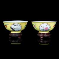 A Pair of Chinese Sgraffito Ground Yellow Glazed Famille Rose Porcelain 'Floral' Bowls, Late 19th/early 20th Century 晚清/民國 黃地軋道開光花卉紋碗一對