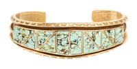 A 14 Karat Yellow Gold and Turquoise Cuff Bracelet, 29.80 dwts.