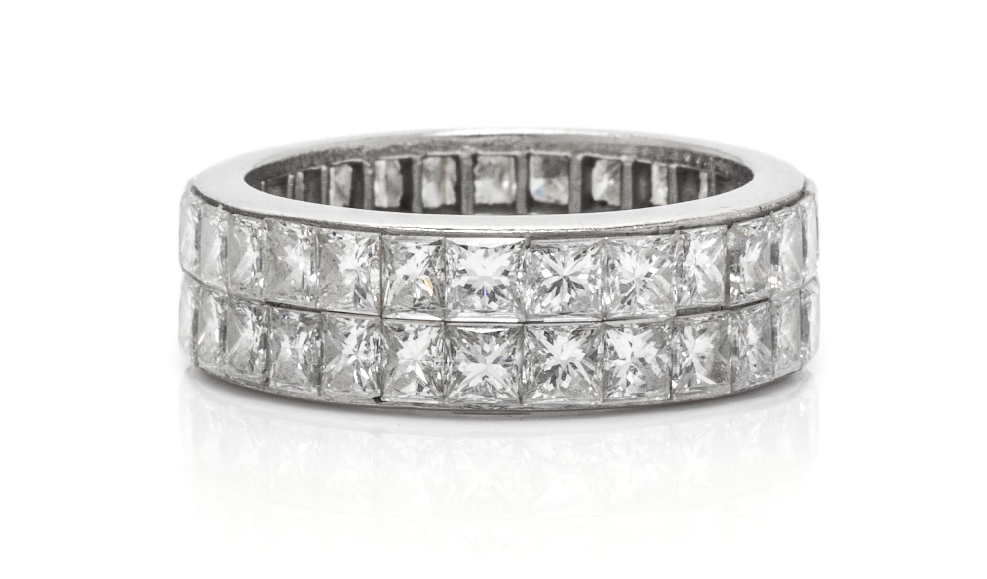 A Platinum and Diamond Eternity Band, 5.60 dwts.