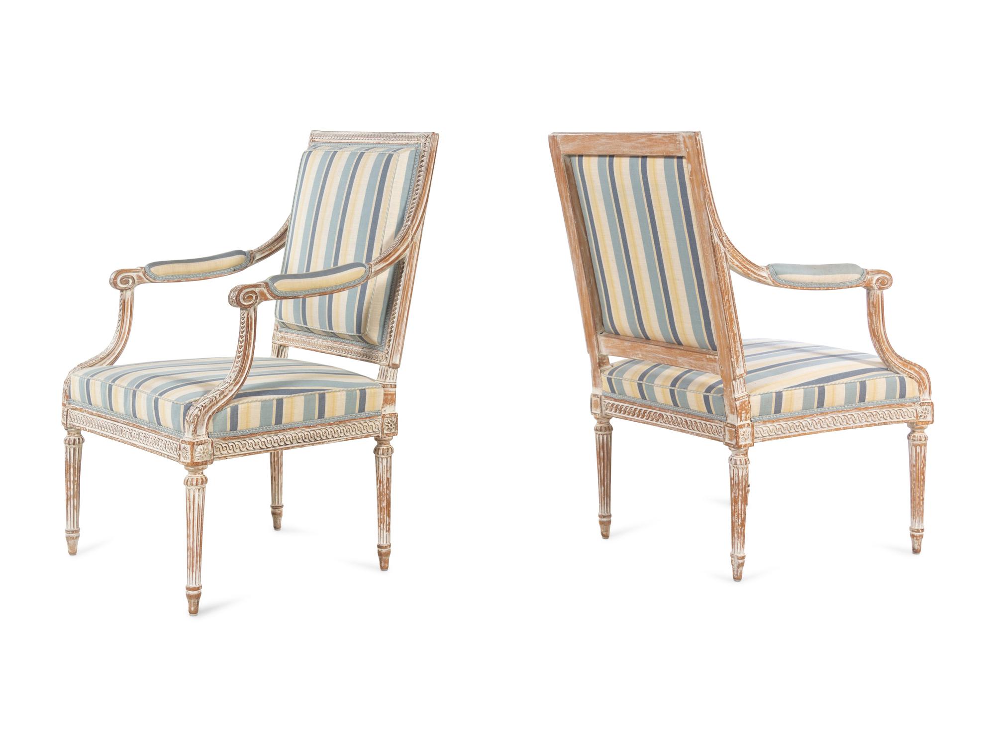A Pair of Louis XVI Style Cream-Painted Fauteuils