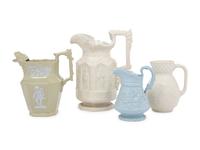 Four English Molded and Glazed Pottery Pitchers