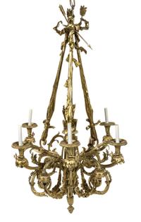 A Louis XVI Style Gilt Bronze Twelve-Light Chandelier Height 54 1/2 x diameter 32 1/2 inches. — 20TH CENTURY