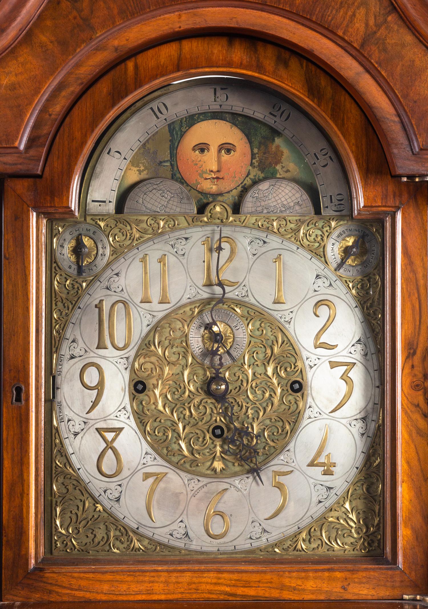 An Elliott Walnut Nine-Tube Tall Case Clock