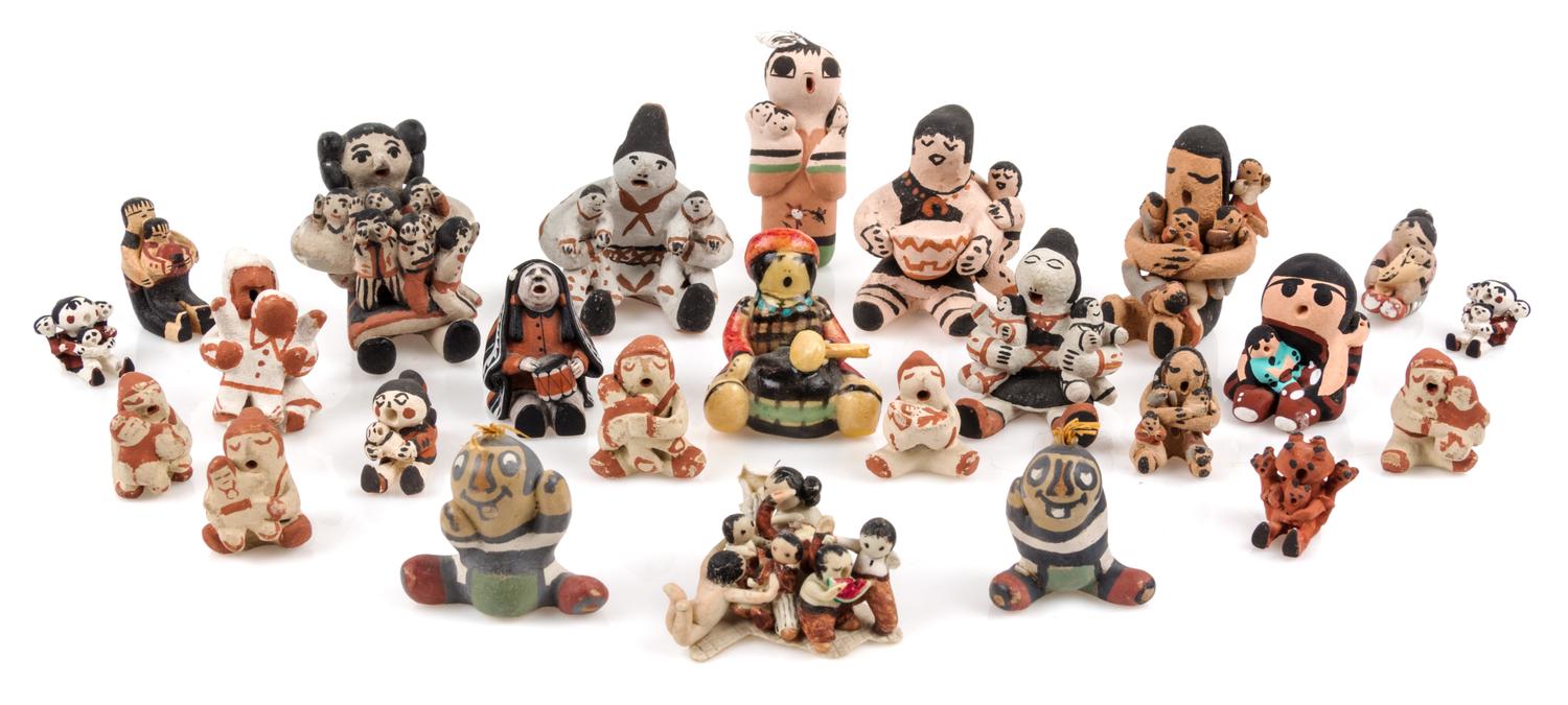 A Group of Twenty-Six Pottery Figures — Various Makers