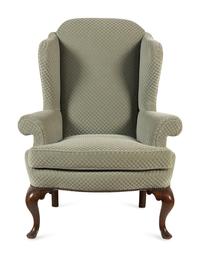 A Queen Anne Style Mahogany Wing-Back Armchair