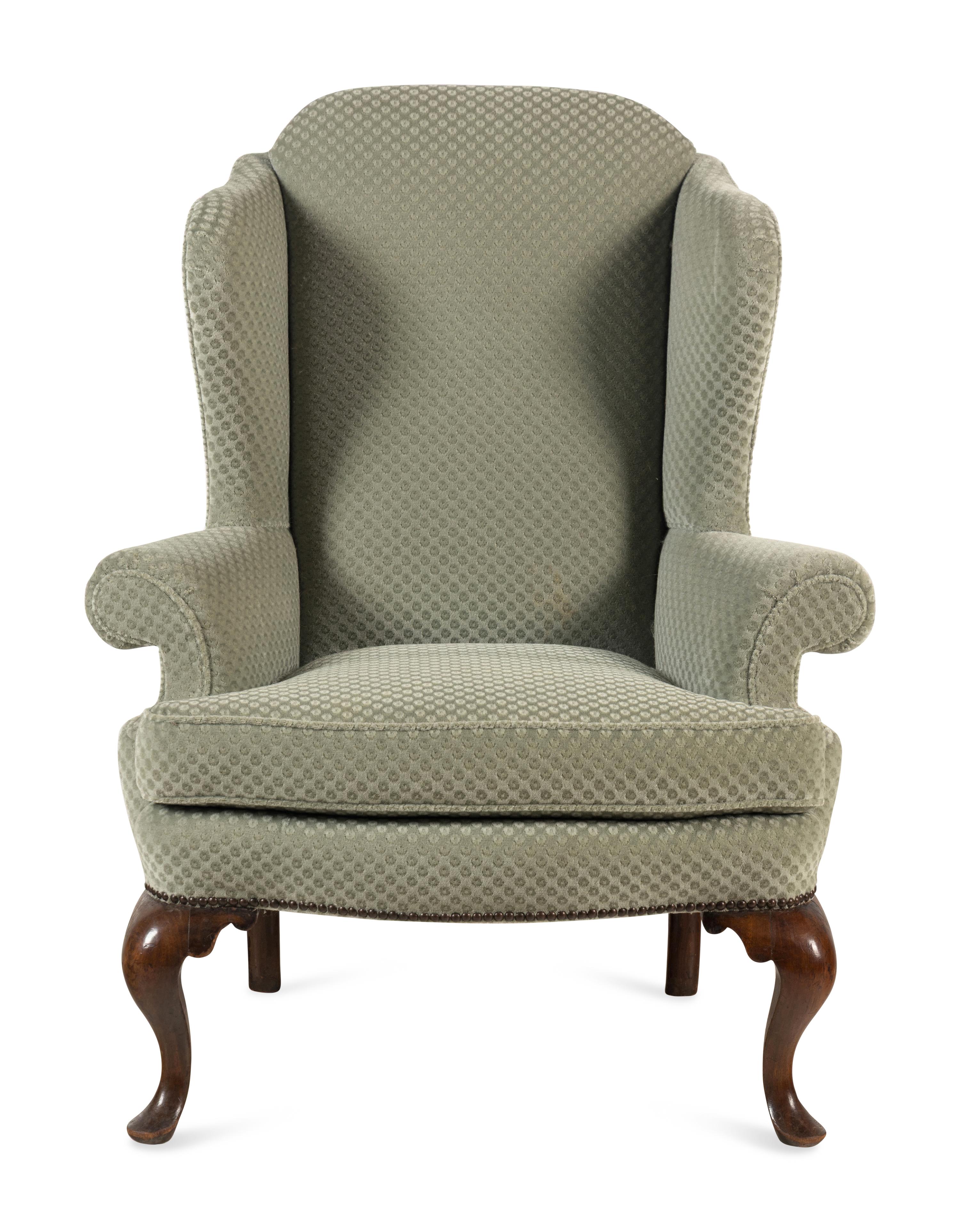 A Queen Anne Style Mahogany Wing-Back Armchair