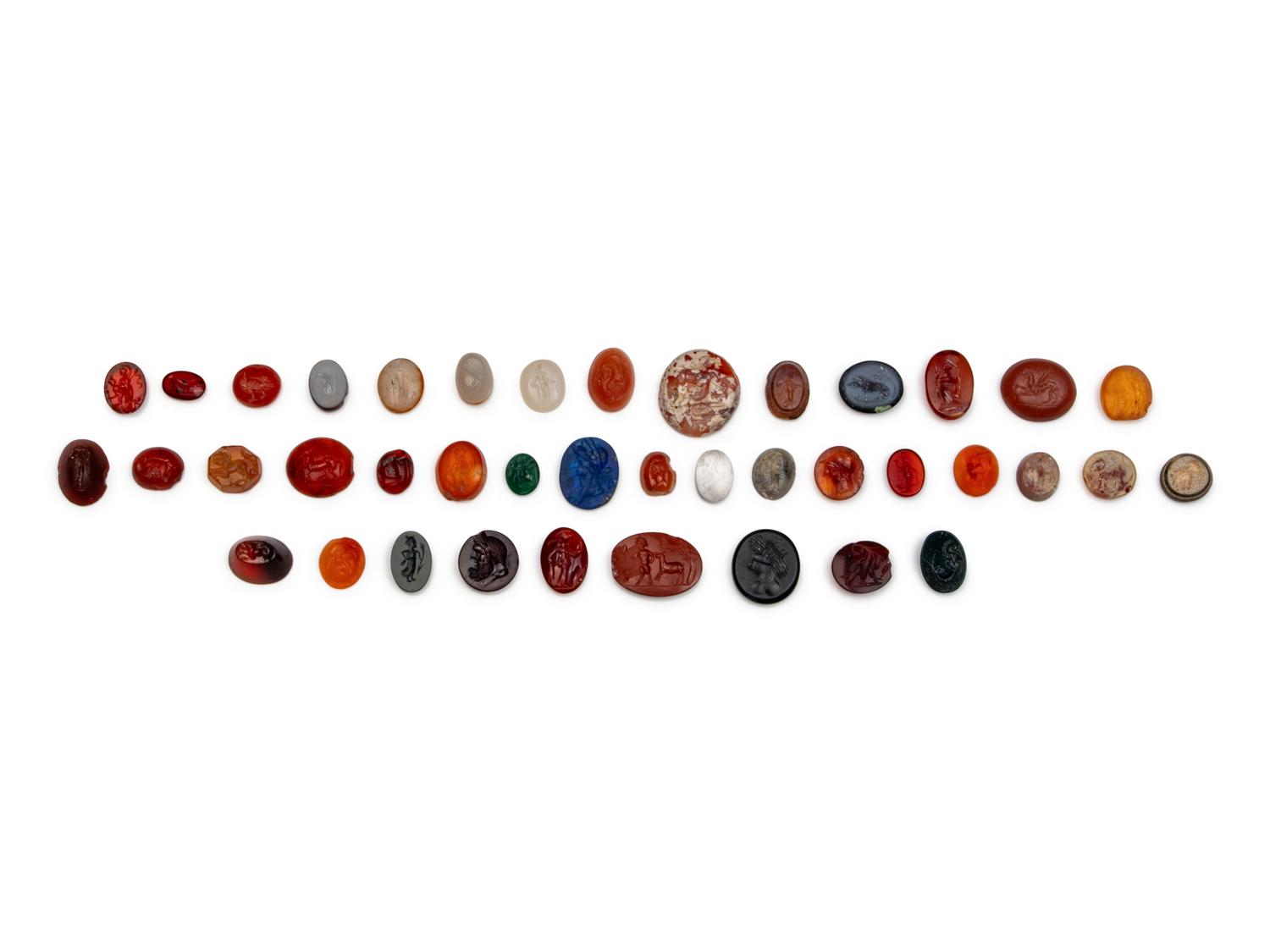 40 Greco-Roman and Persian Hardstone Intaglios and Three Bead Necklaces