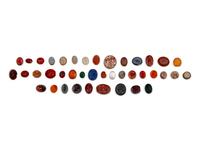 40 Greco-Roman and Persian Hardstone Intaglios and Three Bead Necklaces