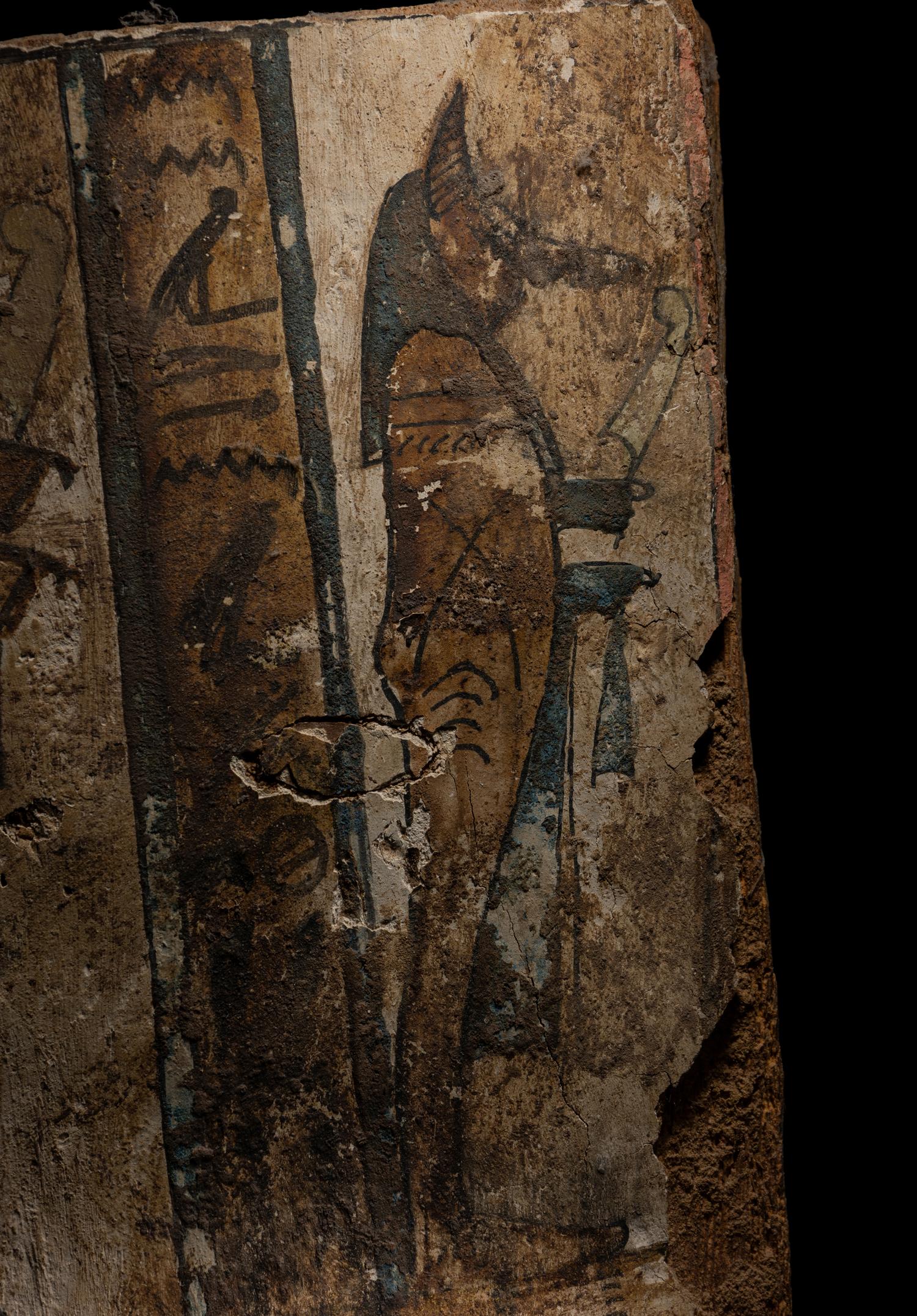 An Egyptian Painted Wood Sarcophagus Panel with the Sons of Horus