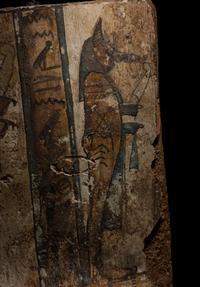 An Egyptian Painted Wood Sarcophagus Panel with the Sons of Horus