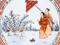 A Set of Eight "Pronk Dame au Parasol" Porcelain Chargers