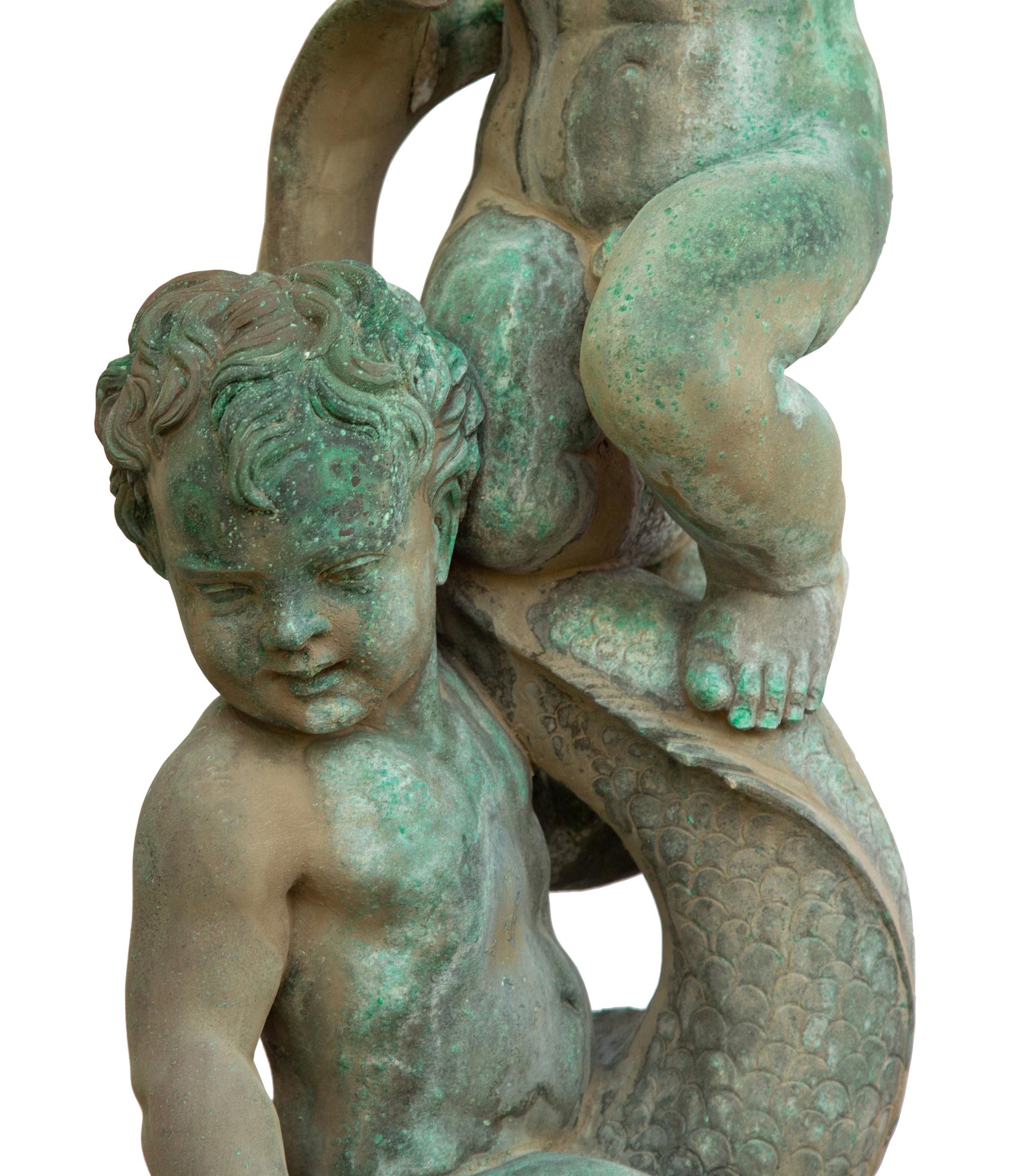 A Cast Bronze and Stone Fountain — 20TH CENTURY