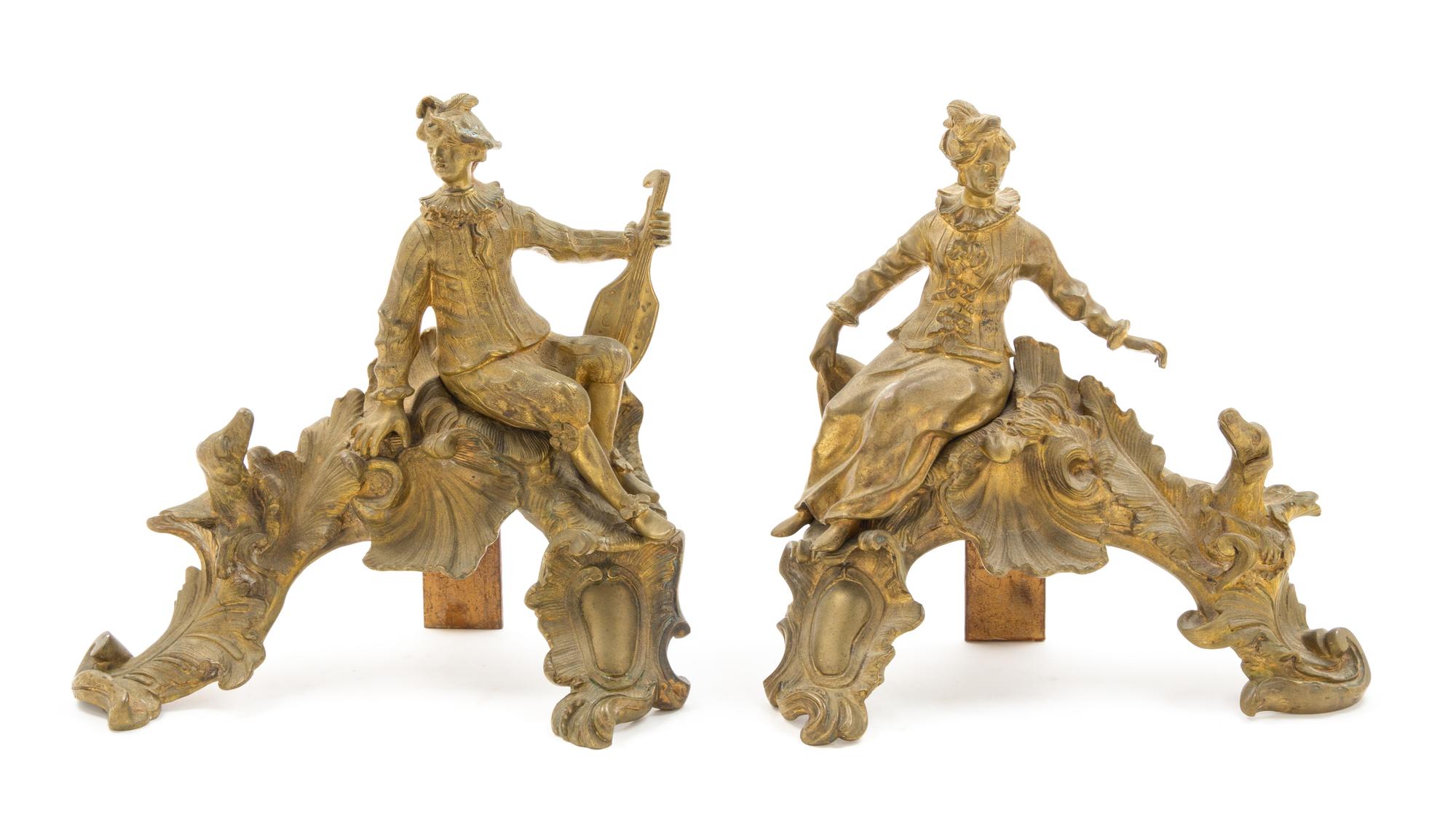 A Pair of French Gilt Bronze Chenets Height 12 3/4 x width of wider 13 inches. — LATE 19TH CENTURY