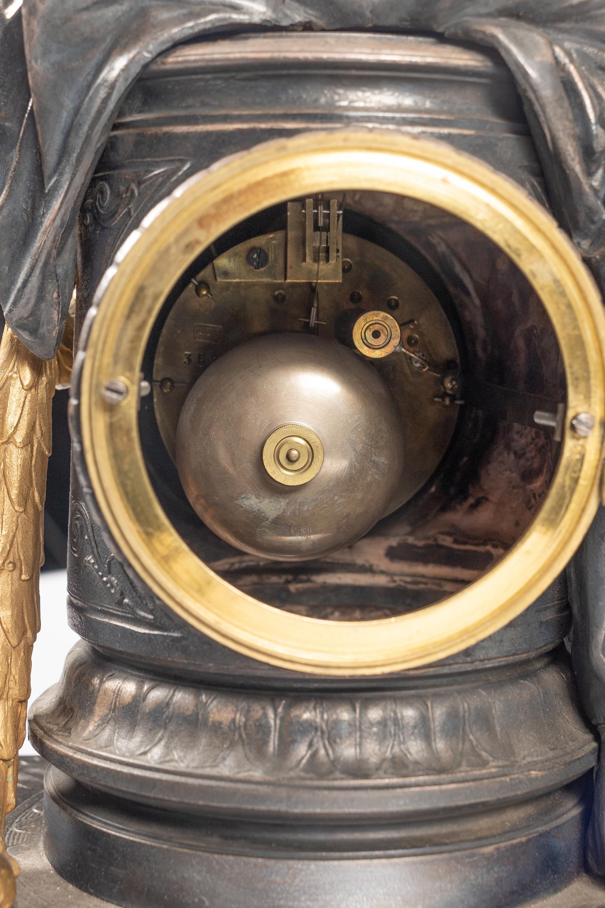 A French Gilt Bronze and Cast Metal Figural Clock