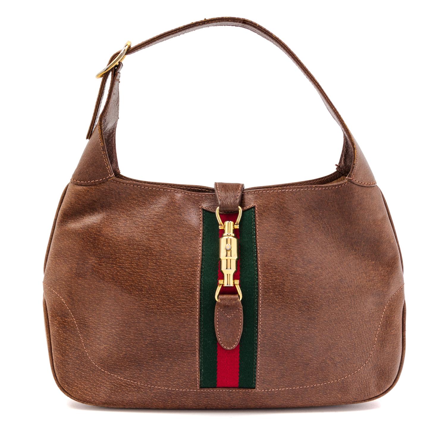 A Gucci Brown Leather Jackie Handbag, 12.5" x 8" x 1.5".