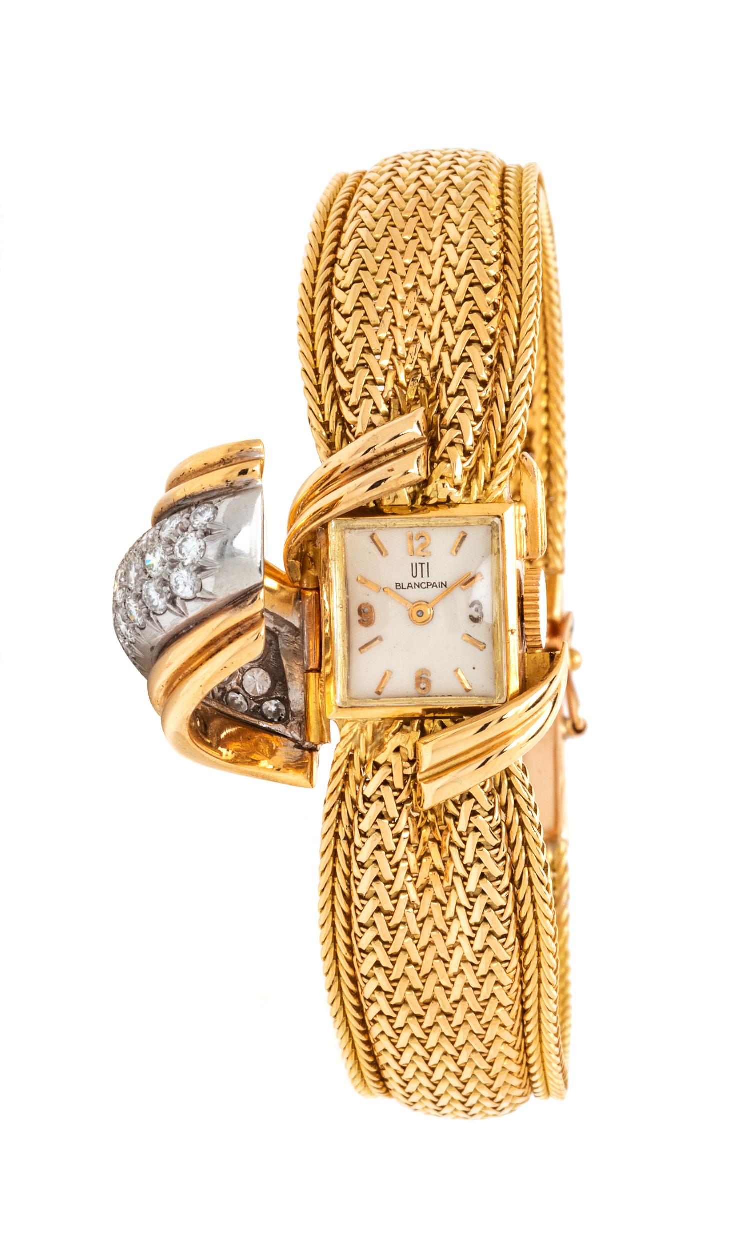 An 18 Karat Yellow Gold, Platinum and Diamond Surprise Wristwatch, UTI Blancpain, 29.80 dwts.