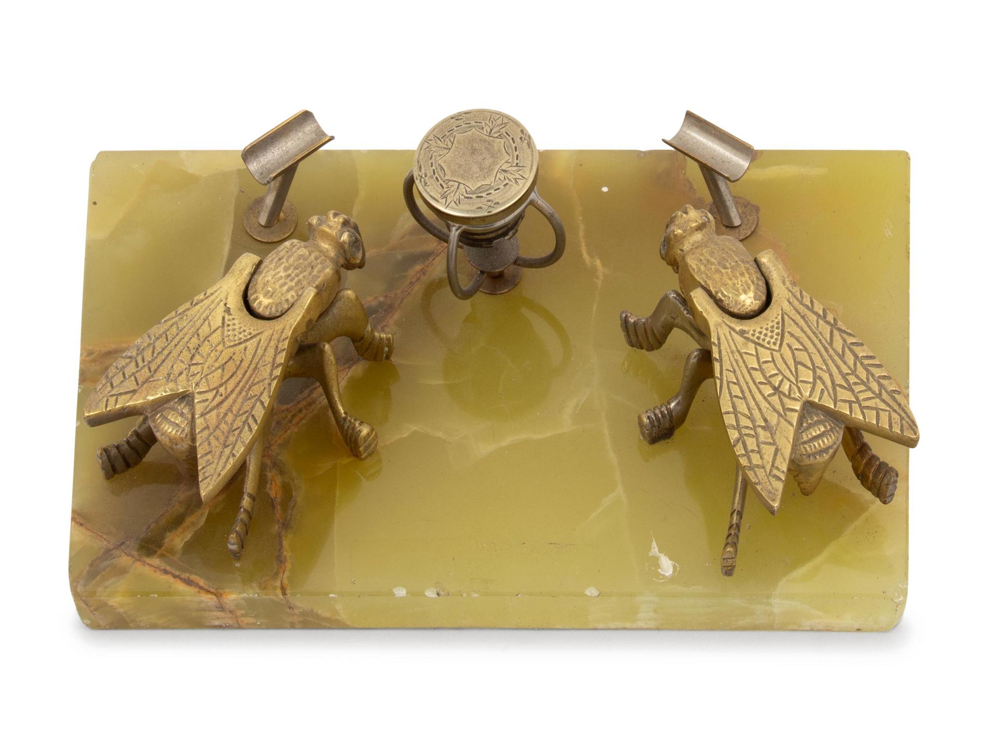 An Onyx and Brass Smoker's Stand